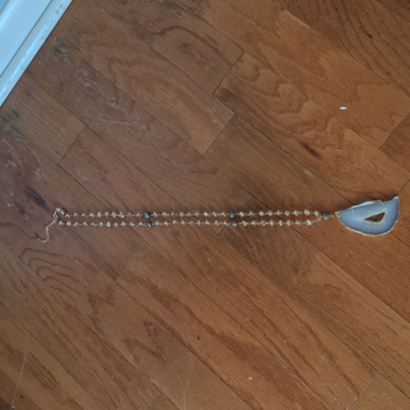 Rose gold necklace, with a large light purple gemstone on the end. - Picture 2 of 2